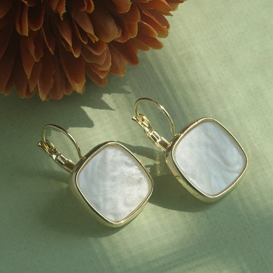 Elegant Gold earrings with square white stones