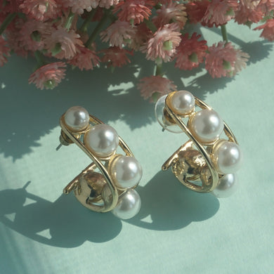Pearl hoop earrings with gold accents
