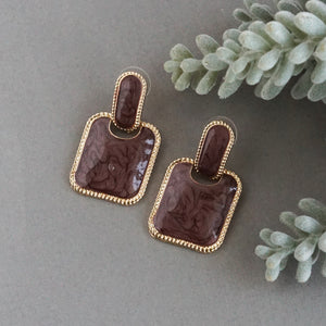 Square-stoned abstract earrings with gold accents