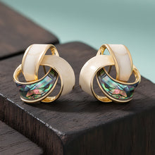 Load image into Gallery viewer, Gold-Plated Interlocking Abstract Knot Stud Earrings with Enamel and Abalone Shell
