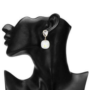 Gold earrings with clear crystal and stone