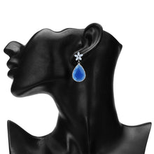 Load image into Gallery viewer, Rhodium-Plated Royal Blue Crystal Teardrop Drop Earrings with American Diamond Floral Studs