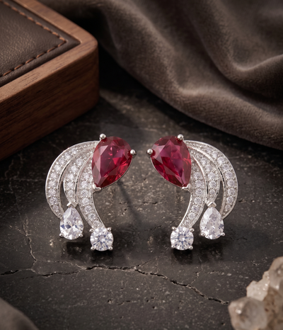 Crimson Arc American Diamond Stud Earrings