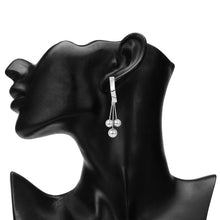 Load image into Gallery viewer, Silver Geometric Ribbon Drop Earrings with Ball Tassels
