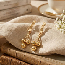 Load image into Gallery viewer, Gold Textured Wavy Bar Ball Drop Earrings