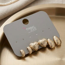 Load image into Gallery viewer, Gold-Toned Textured Earring Set with Small Huggie Hoops, Textured Hearts, and Ribbed Oval Studs (Set of 3 Pairs)