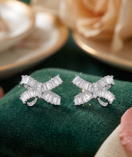 Load image into Gallery viewer, Radiant Ribbon American Diamond Bow Stud Earrings