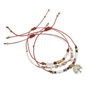 BROWN 3 LAYERED BRACELET WITH FLOWER CHARM
