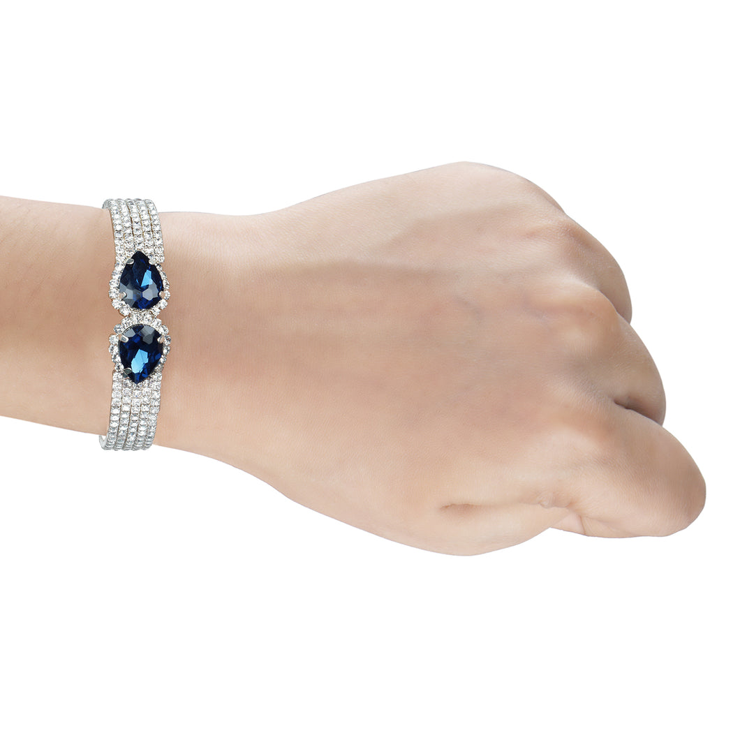 Beautiful silver bracelets encrusted with CZ stones and deep blue saphire stones