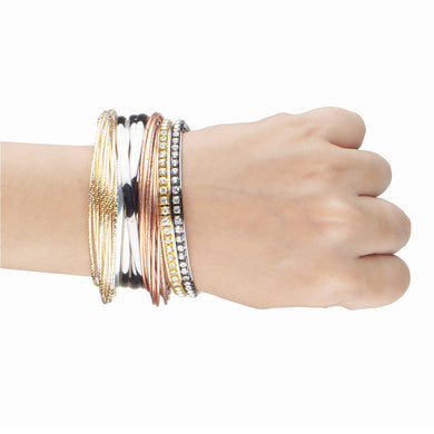 Bunch of classy gold and copper bangles