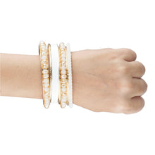 Load image into Gallery viewer, Bunch of pretty white and gold bangles with crystal beads