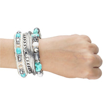 Load image into Gallery viewer, Bunch of bohemian silver bangles with big blue rocks