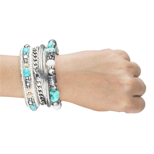 Bunch of bohemian silver bangles with big blue rocks