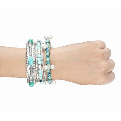 Bunch of gorgeous silver bangles with blue rocks, crystals beads and pearls