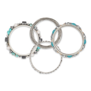 Bunch of bohemian silver bangles with big blue rocks