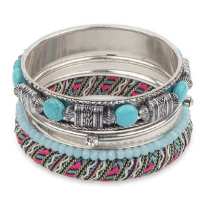 Bunch of chic silver bangles with blue crystals