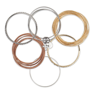 Bunch of classy gold and copper bangles