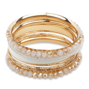 Bunch of pretty white and gold bangles with crystal beads