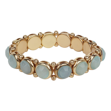 Chunky gold bracelet studded with big blue stones